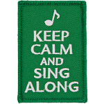 The words Keep Calm And Sing Along on a green background.
