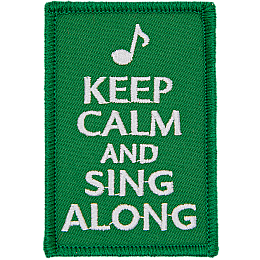 The words Keep Calm And Sing Along on a green background.