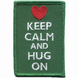 This green, rectangular patch has the words ''Keep Calm and Hug On'' embroidered in white thread. A red heart rests over the lettering.