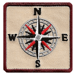A sixteen-pointed compass with the letters N, E, S, W.