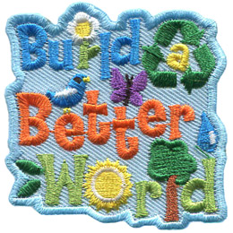 Build a Better World is stitched across this patch. It is surrounded by different green symbols and some letters are replaced with symbols.