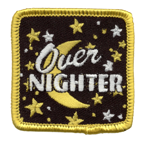 The words Over Nighter are on top of the moon in white. Stars clutter the black background of this patch.