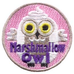 A white owl shaped like a marshmallow stares at the viewer. The words Marshmallow Owl are across the bottom.