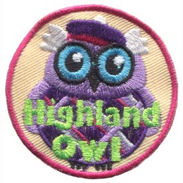 This wide-eyed bird is dressed in a checkered kilt and purple balmoral. The words Highland Owl are embroidered in green stitching.