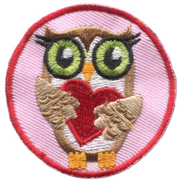 A brown owl holding a red heart.