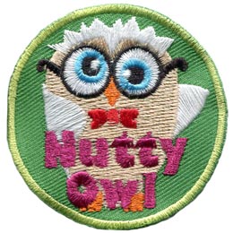 A cream and white owl with glasses and a red bowtie. The words Nutty owl are across the bottom.