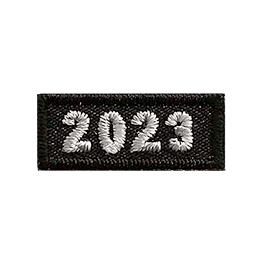 This 1-inch wide by 0.5-inches high rocker forms a straight-edged rectangle. The year number 2023 is embroidered in a bold font.