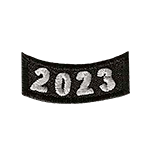 This 1-inch wide by 0.5-inches high rocker forms a curved rectangle. The year number 2023 is embroidered in a bold font.
