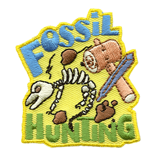 The words Fossil Hunting surround a wooden mallet and chisel carving out a dinosaur fossil.
