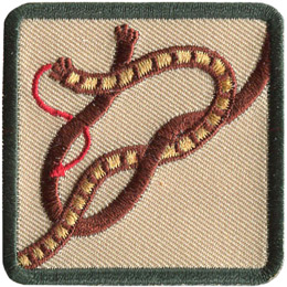 This square badge displays step two on how to make a square knot. Now cross the right side over the left and wrap around the other.
