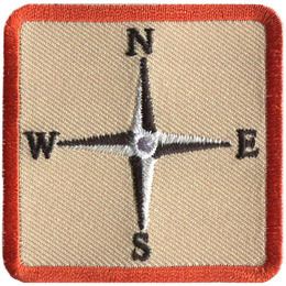 This square patch displays a four-point compass rose showcasing only the four cardinal directions.