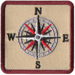 A sixteen-pointed compass with the letters N, E, S, W.