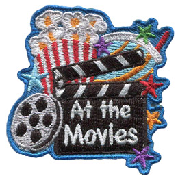 This patch is comprised of a tub of popcorn in the top left, a soda cup in the top right, a movie reel in the bottom left, and a clapperboard bottom center-right. Stars line the right hand side of the crest.