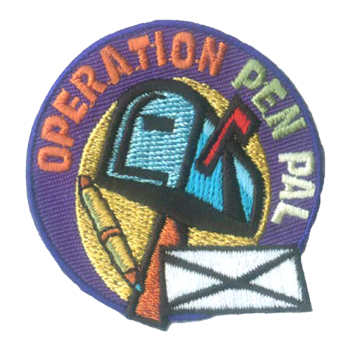 Operation Pen Pal is stitched in an arc around a closed blue mailbox. A pen and letter sit underneath the mailbox.
