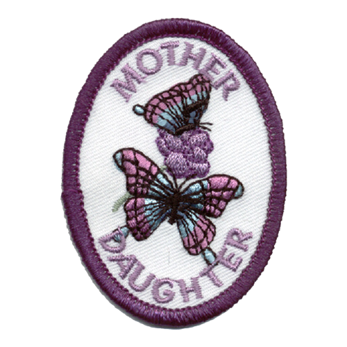 There are two purple and blue butterflies on a flower. The words Mother Daughter are stitched around them.