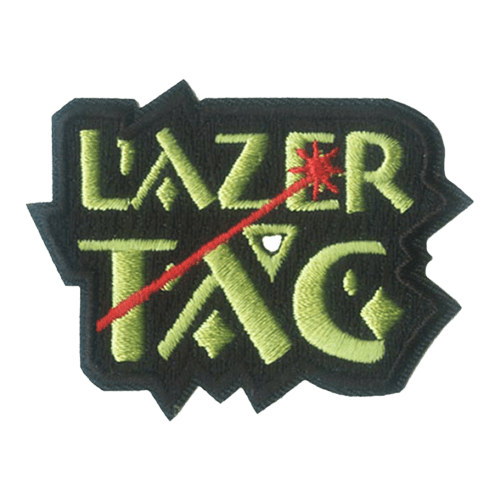 The words Lazer Tag with a red laser blast shooting through the T and impacting the E.