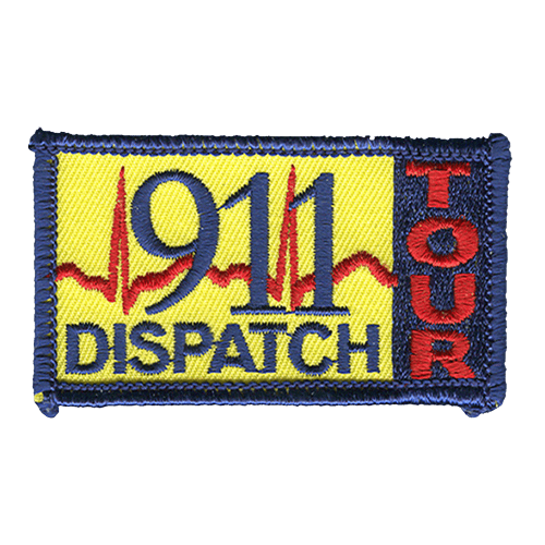 The words 911 Dispatch Tour are on a heart monitor with a heartbeat behind them.