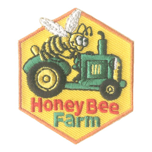 A massive honeybee drives a green tractor. The words HoneyBee Farm are underneath.