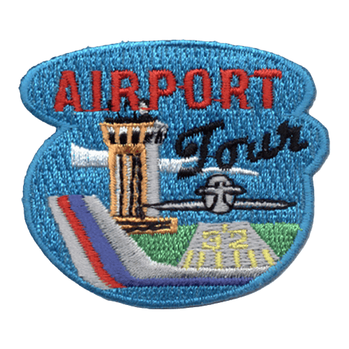 An airport tower directs a plane to land on the runway. The words Airport Tour are stitched across the top of the patch.