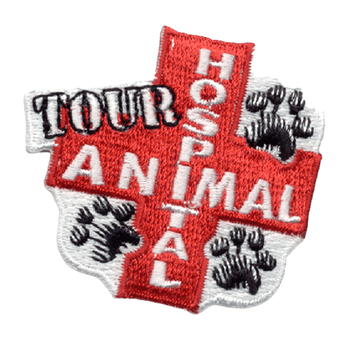A red plus has the words Animal Hospital Tour stitched on it. Three black pawprints are in the corners.