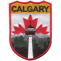 The name Calgary is at the top of the patch. The Calgary Tower is in the center in front of the mountains. The Canadian flag replaces the sky.