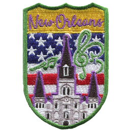 This crest displays St. Louis Cathedral of New Orleans surrounded by musical notes. In the background is the USA flag.