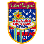 Las Vegas is stitched above a sign that says Welcome Las Vegas Nevada. The background is the USA flag.