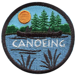 The silhouette of a person canoeing on a peaceful lake surrounded by forest scenery is displayed on this round patch.