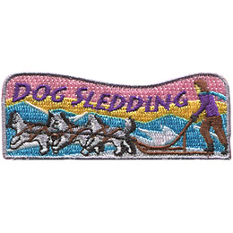 The words Dog Sledding are above a dog sled pulled by three dogs.