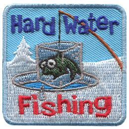 A fish is frozen in a block of ice, suspended above a hole cut in the water. The fish dangs by a fishing line attached to a fishing rod. The words 'Hard Water' are embroidered at the top of this patch and 'Fishing' rests below the fish.