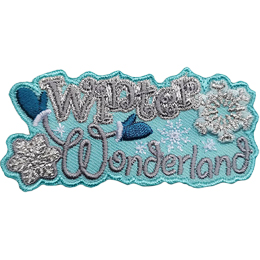 The words Winter Wonderland are stitched in silver thread. The W is wearing mittens, and two snowflakes frame the sides of the patch.