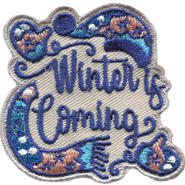 The words Winter is Coming is surrounded by winter clothing: a pair of mittens, a torque, and a scarf. The clothes are made from blue and pink thread.