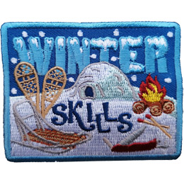 Snowing falls on an igloo. A campfire, matches, dogsled and snowshoes can be seen. Winter Skills is stitched into the background.