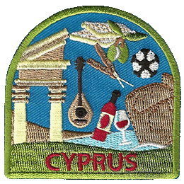 Kebabs, grapes, ancient structures, the ocean, wine, a soccer ball, and a lute are framed by a green border. Cyprus is embroidered below.