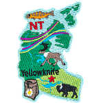 This patch is shaped like the Northwest Territories, decorated with an Arctic Grayling fish, the aurora borealis, a caribou, a mountain avens flower, a buffalo, and Yellowknife.