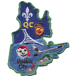 This patch is in the shape of the Canadian province of Quebec. From top to bottom, the Flue-de-lis, a jug of maple syrup, hockey stick and puck, Bonhomme, and Quebec City.