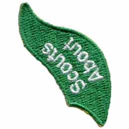 The words Scouts About are stitched on a green flame.