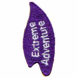The words Extreme Adventure are stitched on a purple flame.