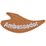 A cream flame with the word Ambassador on it.