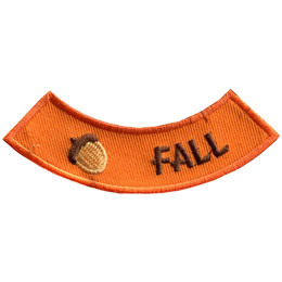 This rounded rocker has an acorn followed by the word Fall.