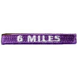 The number 6 Miles are stitched in white on a purple rectangle.