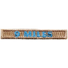 The words 9 Miles are stitched in blue on a brown rectangle.