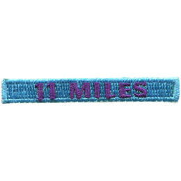 The words 11 Miles are stitched in purple on a blue background.