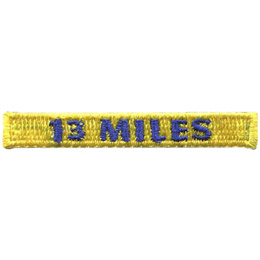 A yellow patch with the words 13 Miles in purple on it.