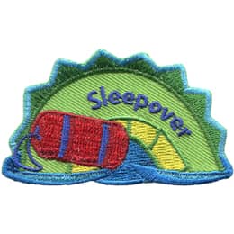 A green and yellow sea serpent hump with a rolled-up red sleeping bag and the word Sleepover on it.